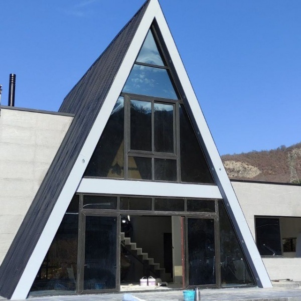 ویلای سویسی با سازه ال اس اف در نور